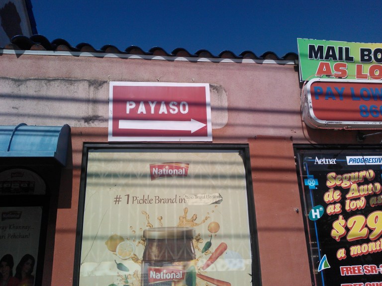 Truthfully it's a sign pointing to The "Payaso Party Supply Store." But out of context, it's just hilarious!